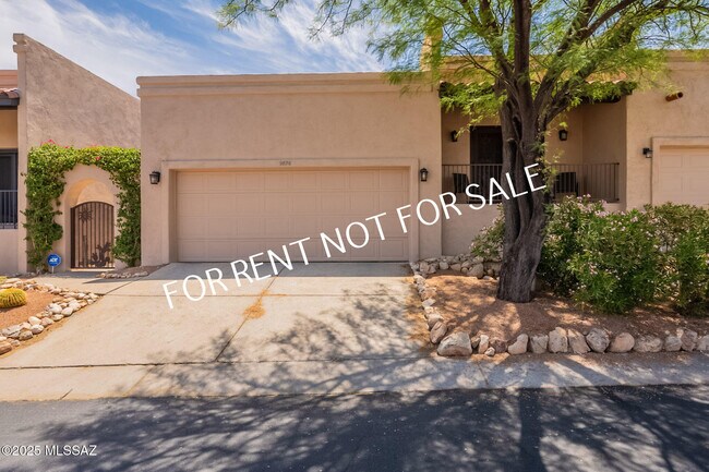 9876 N Ridge Shadow Pl