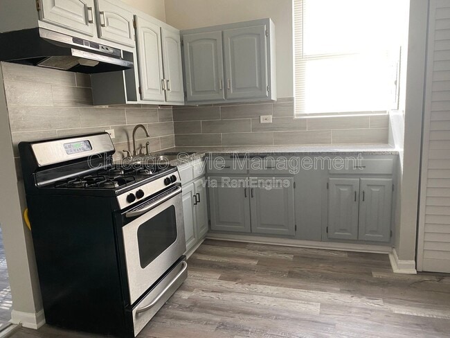 Building Photo - 7614 S Maryland Ave Unit 1