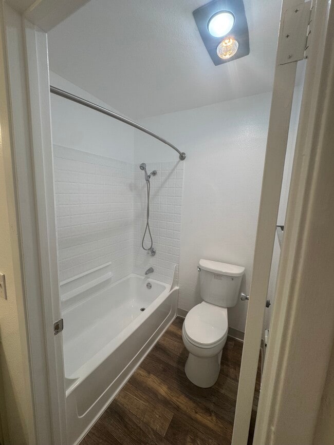 Toilet/Shower - Amberwood Apartments