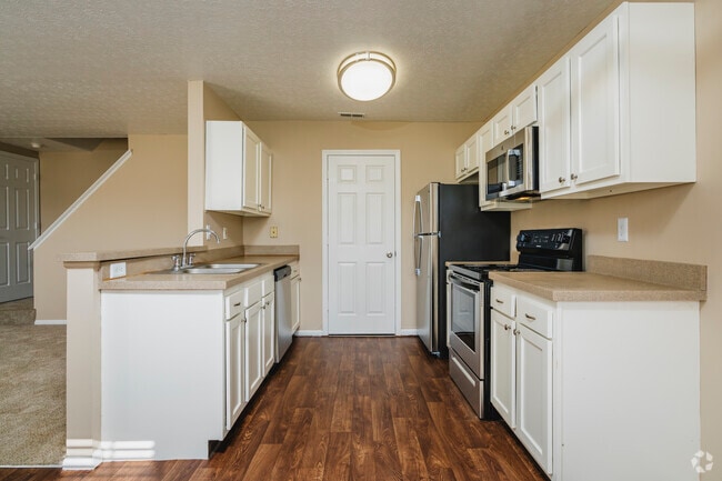 2BR, 1BA - 1,060SF - Kitchen - The Village at Appian Way