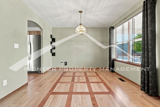 Photo - Spacious Home with Central AC and 2-Car Garage