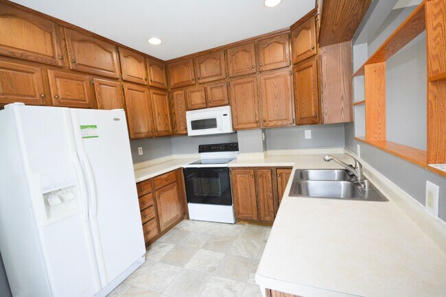 Photo - Gorgeous home on corner lot with fenced yard!