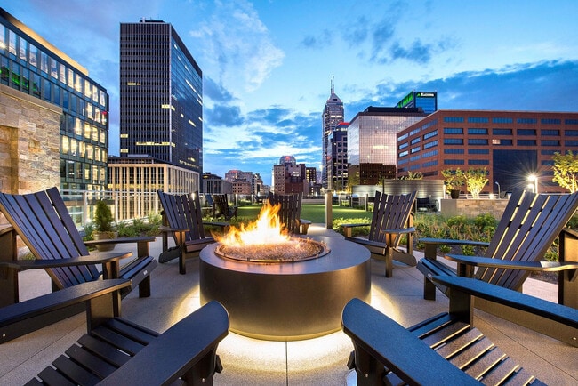 Rooftop Patio Featuring Fireplace