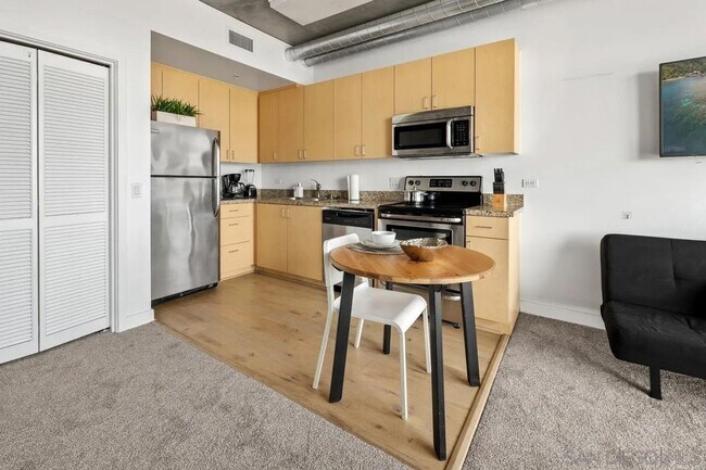 Photo - Stylish East Village Studio | Rooftop Amenities | Flexible Lease Options