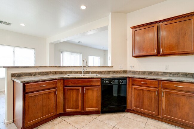 Photo - 4 Bedroom in Tolleson.  Landscaping redone.  Newer Carpet, Available February 1st!!!  Great 2 sto...