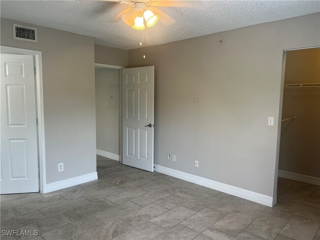 Building Photo - 8245 Ibis Club Dr Unit 410