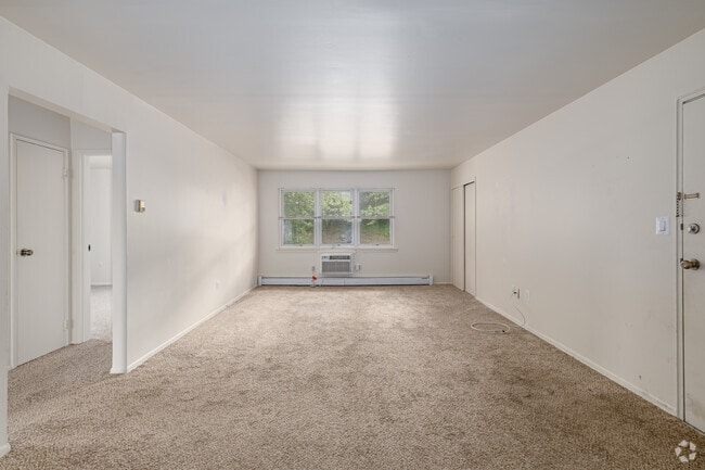 2BR, 1BA - 921SF - Living Room - Hillside Gardens