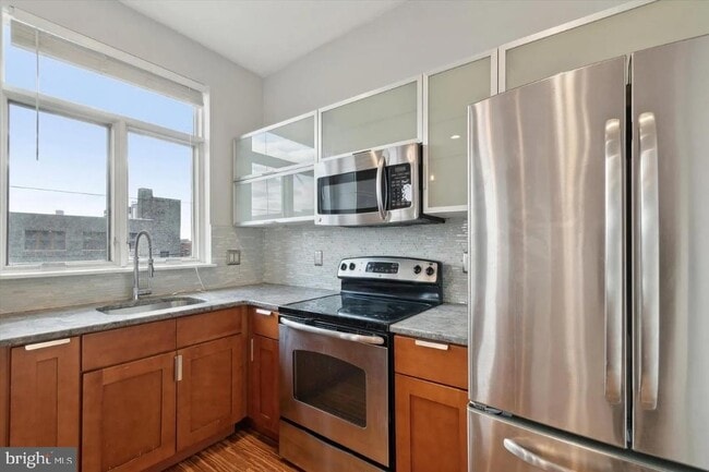Kitchen with stainless steel appliances - 808 N 4th St Unit 3