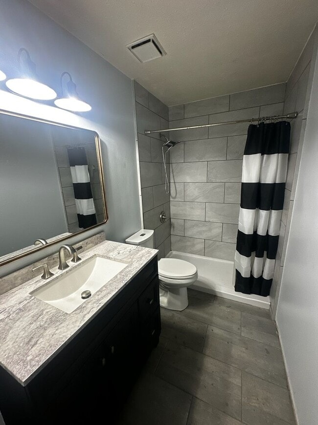 Photo - Cozy & Convenient 2 Bedroom, 1 Bath Duplex with Large Yard & Deck
