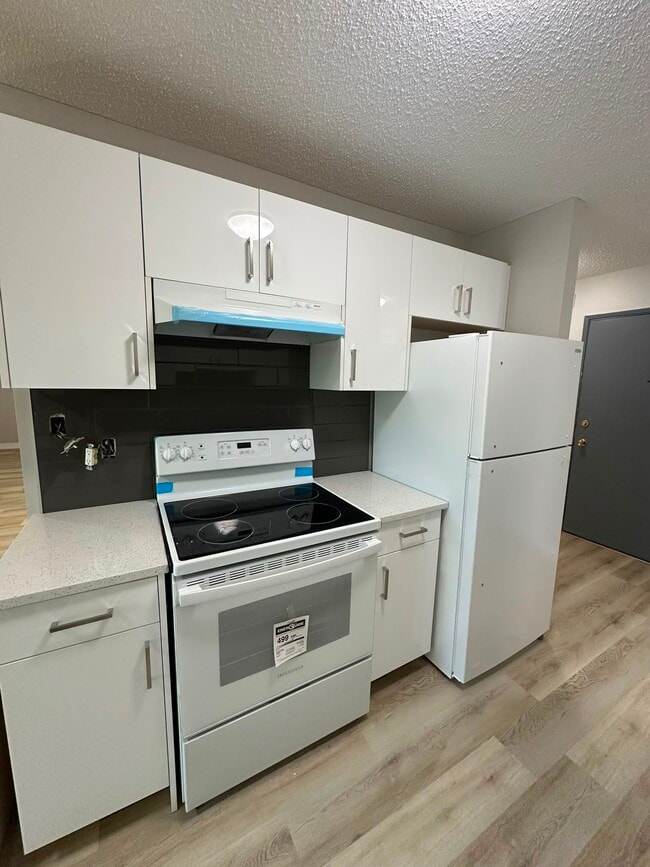 Building Photo - 4507-244 44 Ave Unit 206