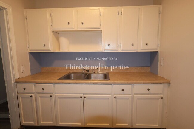 1066 W 13th St