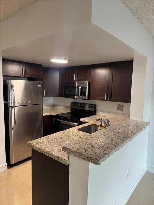 Building Photo - 670 NW 85th Pl Unit 11-206 Rental