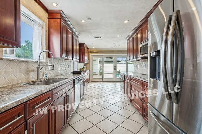 Photo - Spacious Metairie Home with Pool Access, Gated Entry & Modern Conveniences