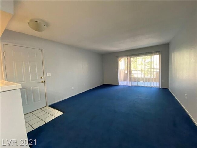 Building Photo - Cozy 1-Bed Condo in Gated 89128 Community ... Unit 206