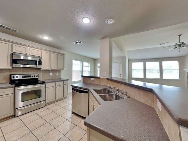 Photo - Liberty Crossing Beauty with Space to Spare, a Gameroom to Love & Entertaining Made Easy!