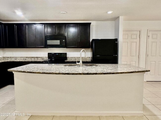8709 Lake George Cir E