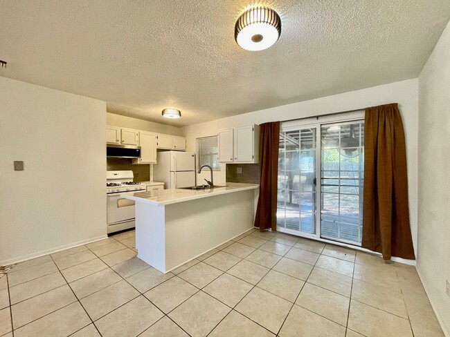 Photo - Charming 3 Bedroom Home w/ 1 Car Garage and Large Fenced Yard!!