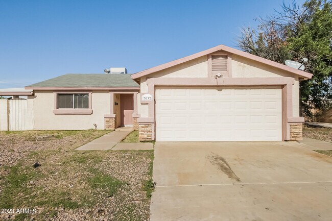 Photo - 7032 W Holly St House