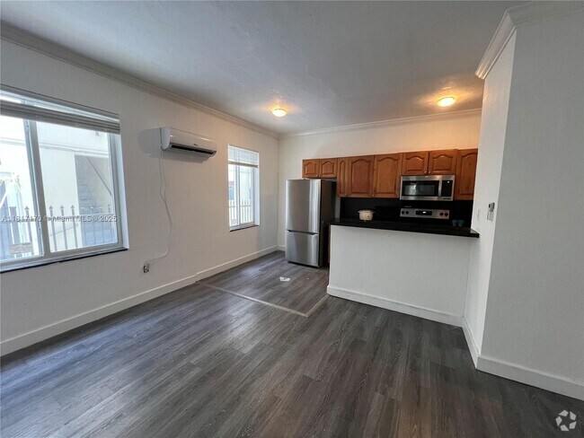 Building Photo - 7920 Harding Ave Unit 1 Rental