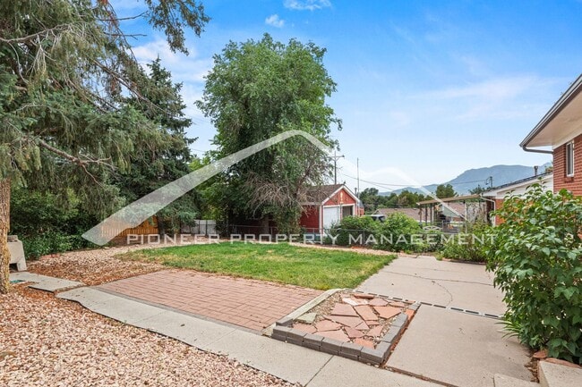 Building Photo - Spacious 4-Bed, 2-Bath Home with Finished ...