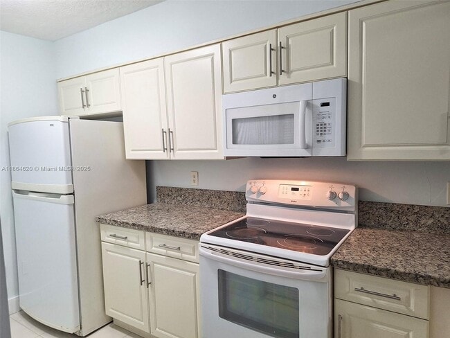 Photo - 18810 NW 57th Ave Unidad 104