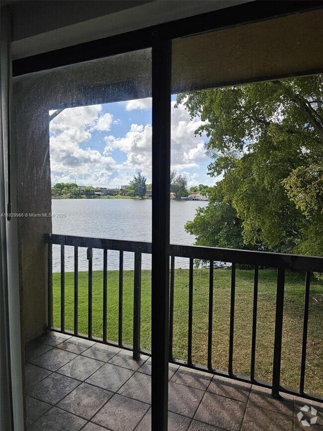 Building Photo - 6685 W 26th Ct Unit 202-8 Rental