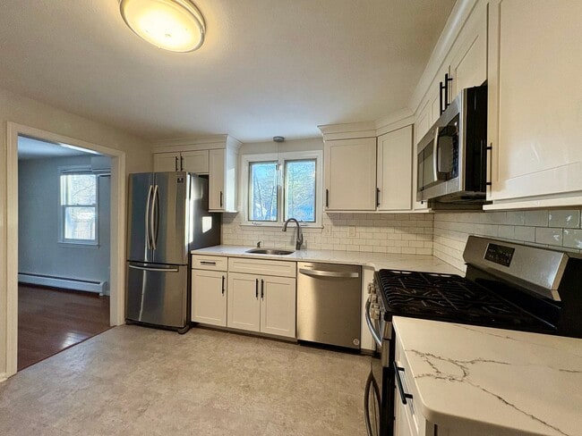 Photo - Available Now | 3 Bed, 1.5 Bath Single-Family Home in Westford, MA | Updated Kitchen, Finished Ba...