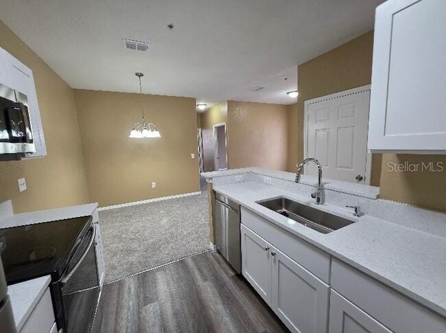 Building Photo - 873 Grand Regency Pointe Unit 103