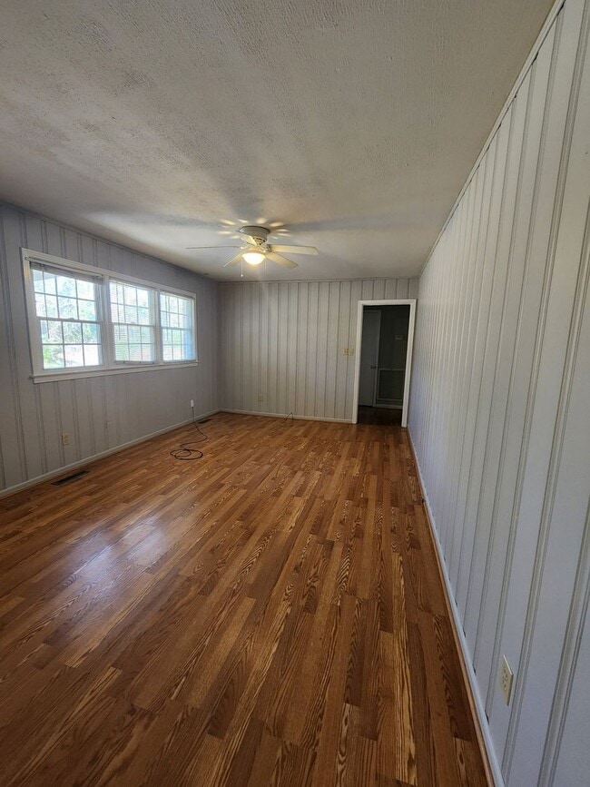 Photo - Spacious 3-Bedroom Brick Home with Two Living Areas & Fenced Backyard!