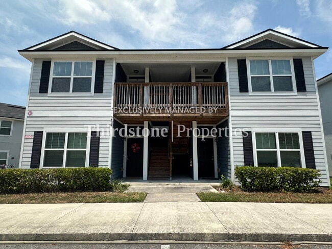 Building Photo - 9139 Western Way Unit 4