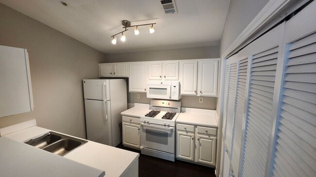 Photo - Top-Floor 2-Bed, 2-Bath Condo with Firepla...