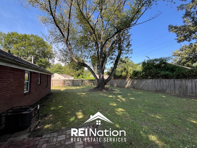 Photo - INCREDIBLE VALUE! 3BR/1.5BA Memphis Home | Brick Fireplace | Fenced Yard!