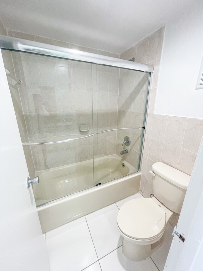 Bathroom with Tub & Glass Shower Enclosure