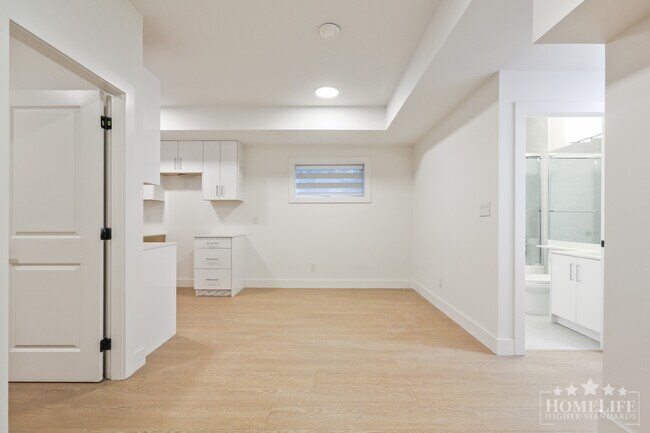 Photo - Modern 2-Bedroom Basement Suite on 16th Av... Unit Basement