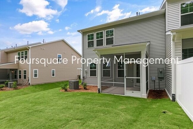 Photo - Spacious End-Unit Townhome with 2nd Floor Loft, Screened-In Porch & 2-Car Garage , High-Speed Int...