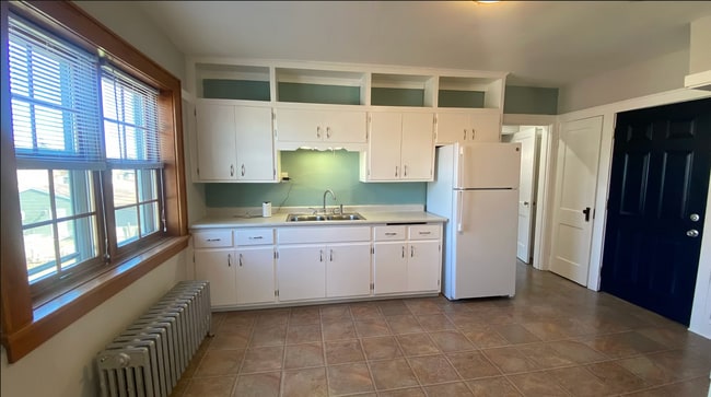 Building Photo - 1802 E Howard Ave Unit 3