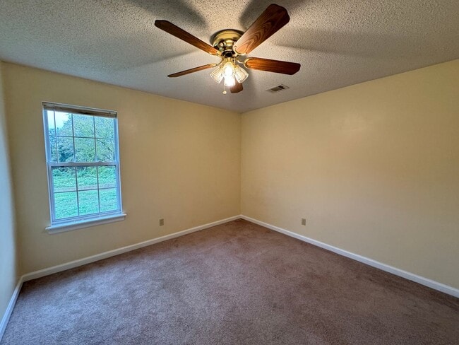 Photo - Charming 3BR/2BA Single-Family Home in a Peaceful Commerce Location