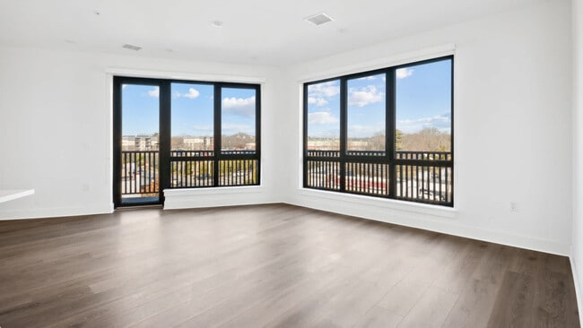 Living Room with Balcony and Hard Surface Flooring