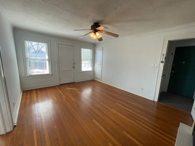 Photo - Charming 1 Bed + Bonus Room Near Cultural District — Hardwoods, Fireplace & Sunroom! Unit 4800 Bryce Ave #3