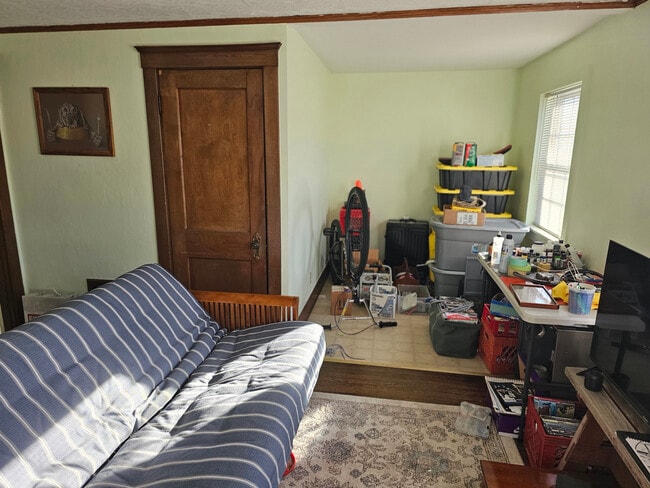 Living Room full of junk - 1 Page St Unit 1 Page