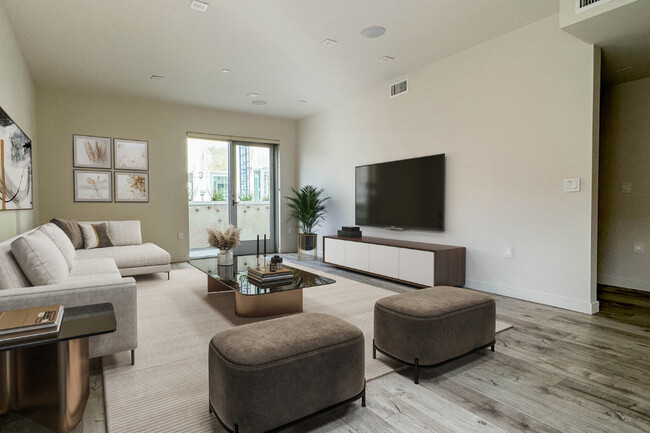 3 BR, 2 BA - Living Room (Highland Suite) - Legacy Tamarind Apartments