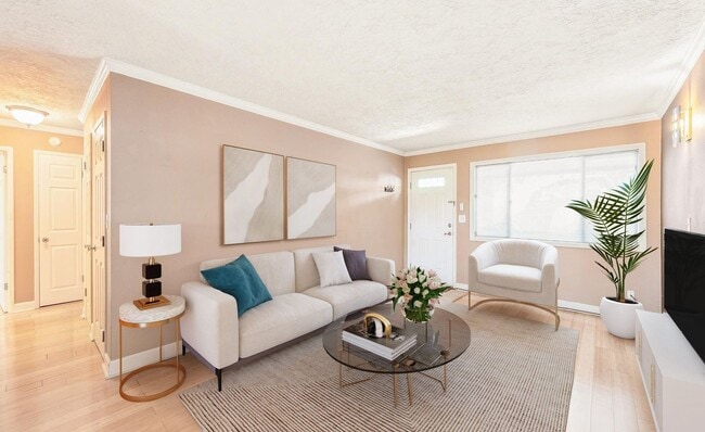 Photo - Spacious 2-Bedroom Condo with Forest Views, Private Balcony, In-Unit Laundry & Community Amenitie...