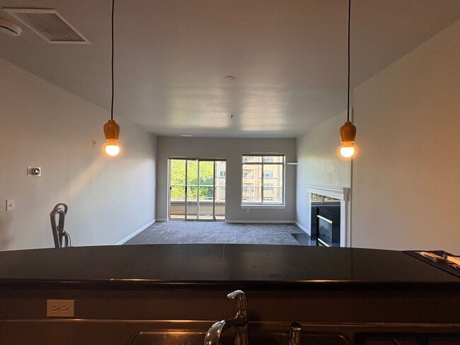 Photo - Top-Floor Corner 2BR with Lake Union Views + Garage Parking Included!