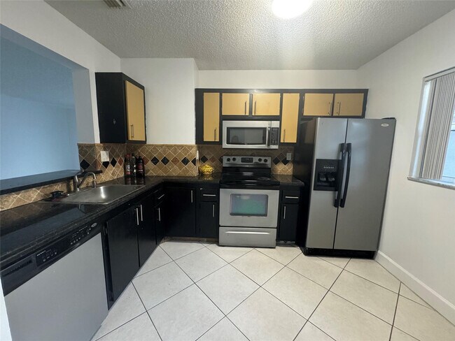 Photo - 12141 Royal Palm Blvd Unit 7E