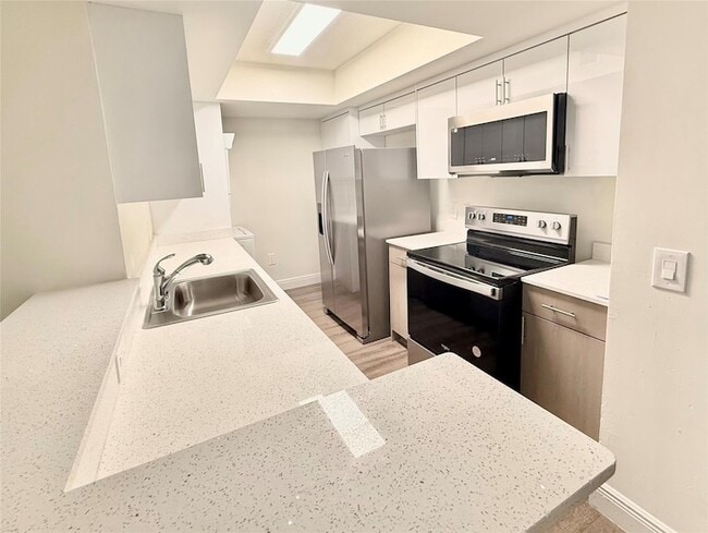 Building Photo - 18335 NW 68th Ave Unit 255-201
