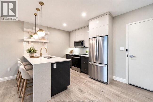 Photo - 531 Pelissier St Unité 405