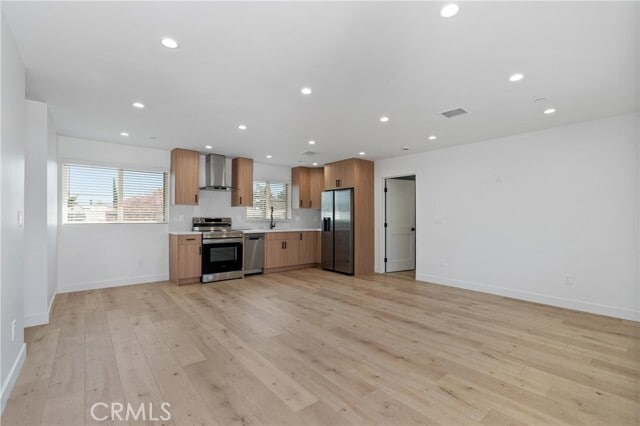 Building Photo - 11142 Woodley Ave Unit 1/2 Rental