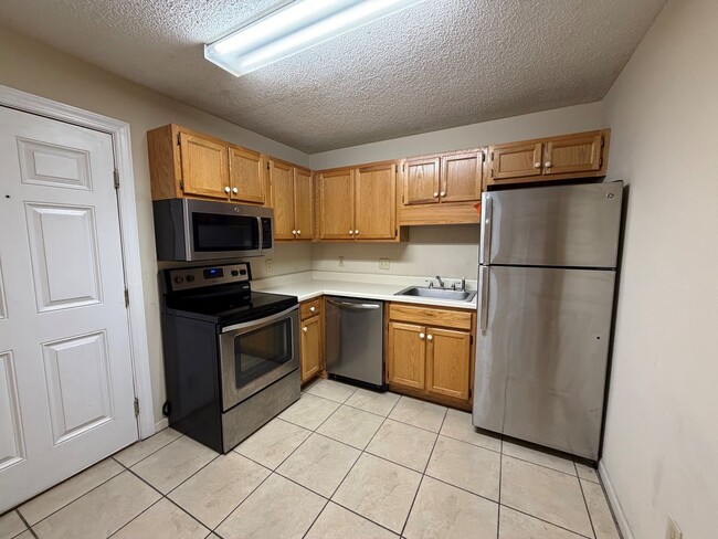 Photo - Peak Apartments