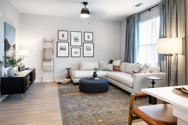 Living room with ceiling fan - Avalon Lake Norman