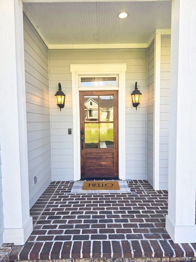 Photo - Spacious 4BR/3BA Home with Open Floor Plan, Screened Porch & Fenced Backyard